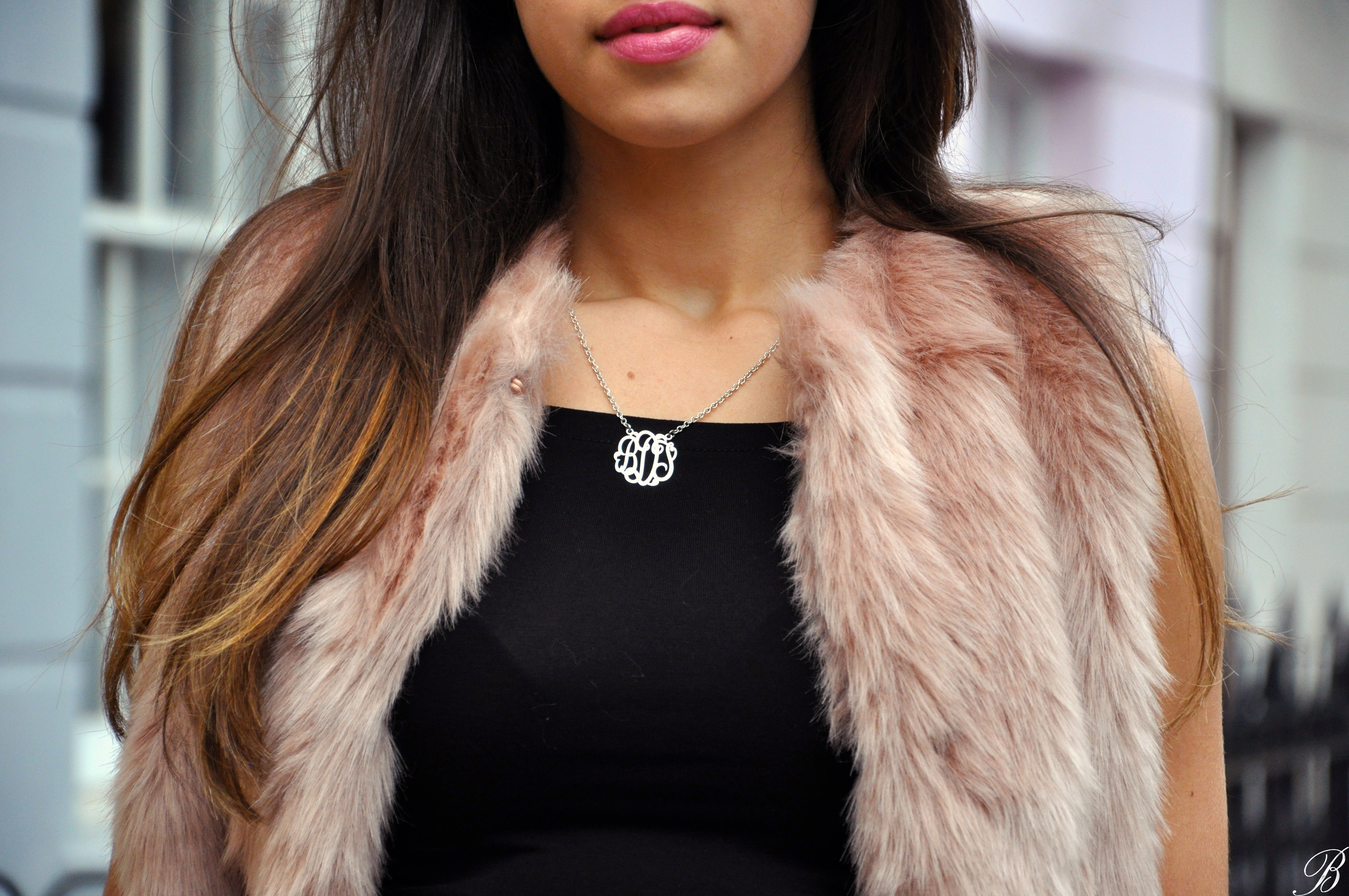 pink fur and striped pants