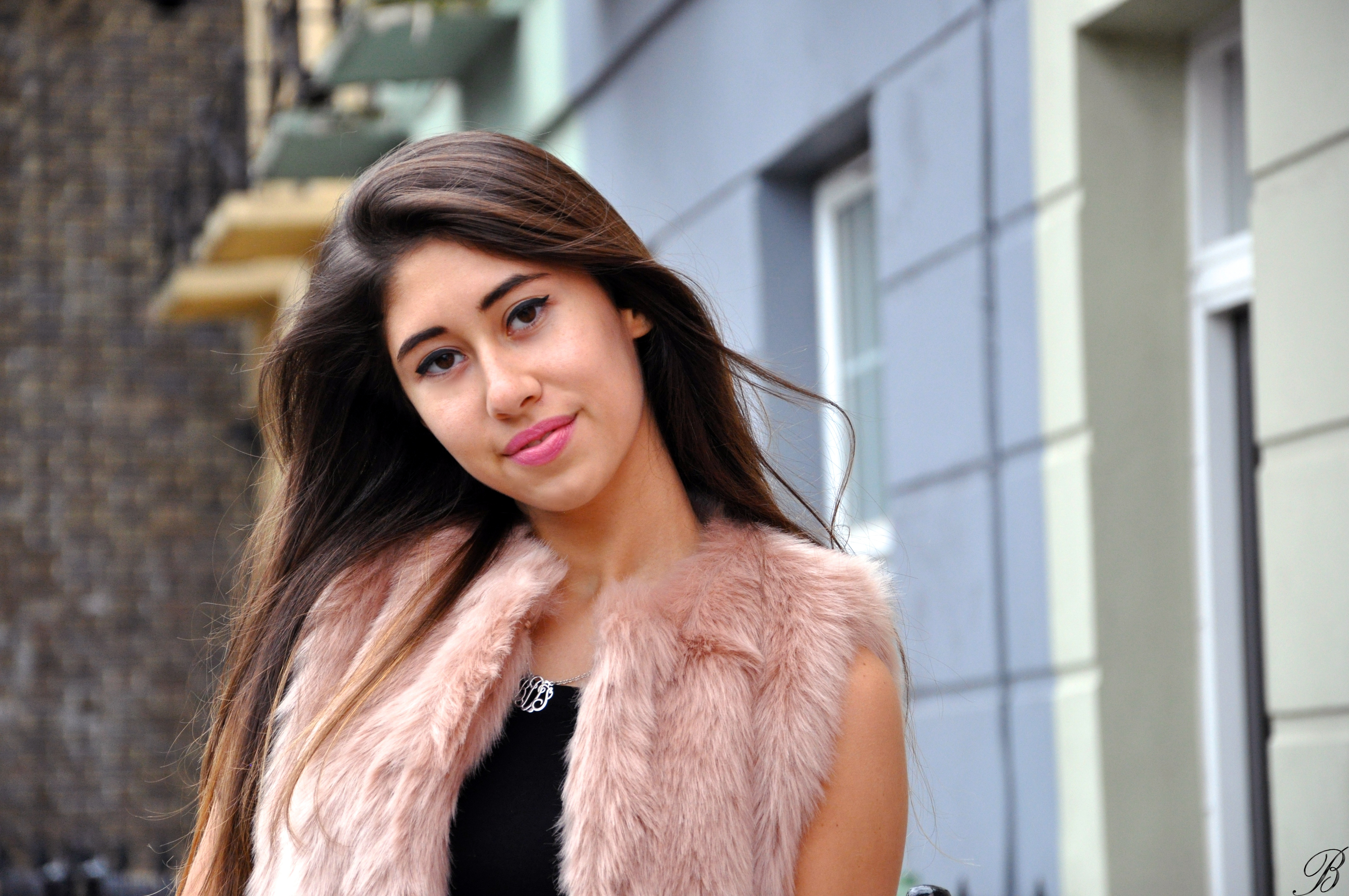 pink fur and striped pants