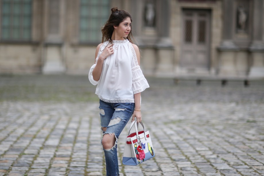 off the shoulder top, denim jeans and kurt geiger bag