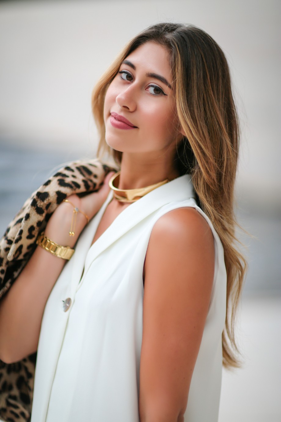 foundation louis vuitton wearing leopard jacket, zara white romper, baublebar choker