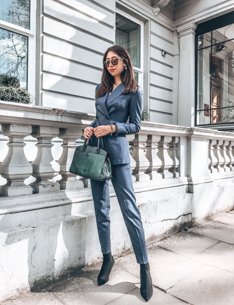 the power suit wearing suistudio